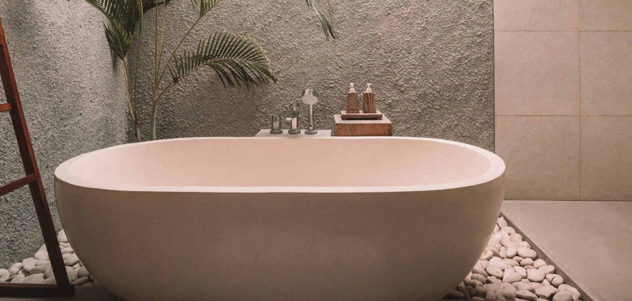 Bathtub under a skylight window 